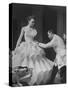 Buyer Sampling an Evening Dress on a Model to Check Its Quality-Nat Farbman-Stretched Canvas