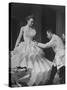 Buyer Sampling an Evening Dress on a Model to Check Its Quality-Nat Farbman-Stretched Canvas