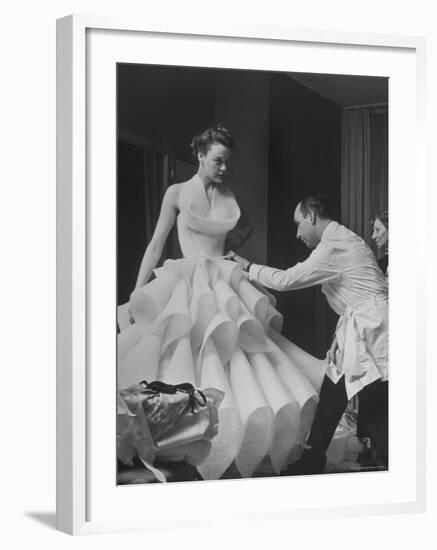 Buyer Sampling an Evening Dress on a Model to Check Its Quality-Nat Farbman-Framed Photographic Print