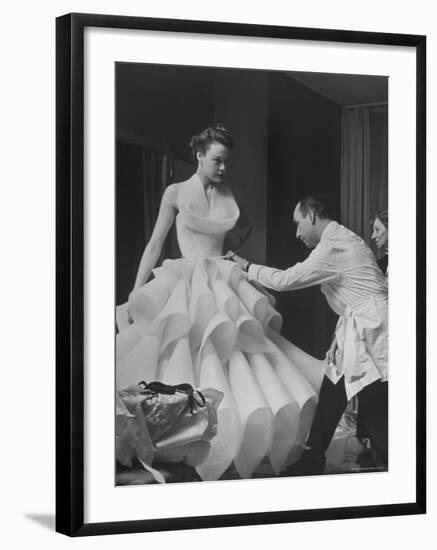 Buyer Sampling an Evening Dress on a Model to Check Its Quality-Nat Farbman-Framed Photographic Print