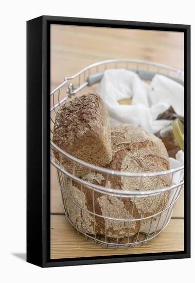 Buying bread without packaging, in the unpackaged 'Stückgut' shop, Altona, Hamburg, Germany-Andrea Lang-Framed Stretched Canvas