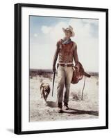 ca., 1953 --- Actor John Wayne on the movie set of "Hondo" (Hondo, L'Homme du Desert), directed by-null-Framed Photo