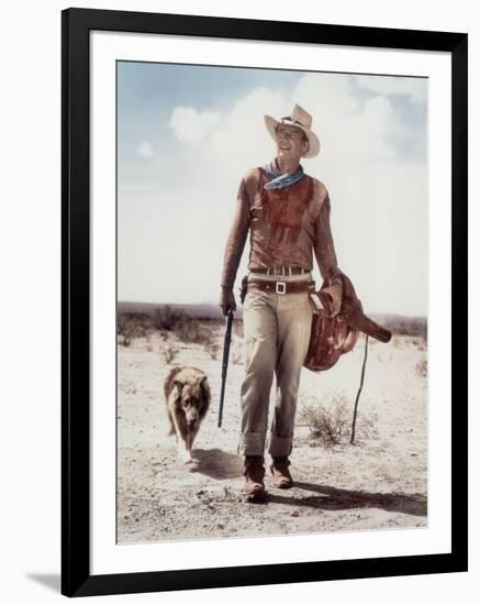 ca., 1953 --- Actor John Wayne on the movie set of "Hondo" (Hondo, L'Homme du Desert), directed by-null-Framed Photo