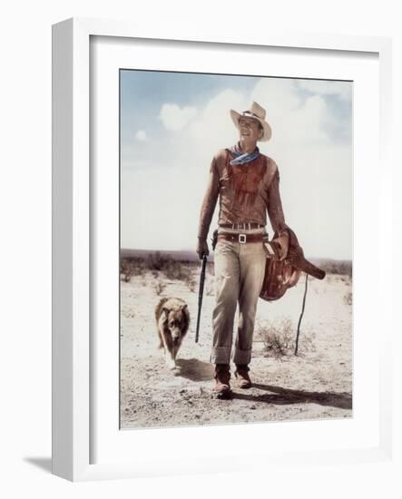 ca., 1953 --- Actor John Wayne on the movie set of "Hondo" (Hondo, L'Homme du Desert), directed by-null-Framed Photo