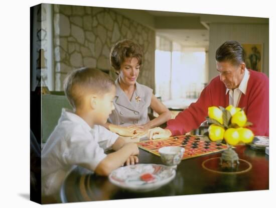 CA Gov. Candidate Ronald Reagan, Wife Nancy and Son Sitting at Table Playing Checkers at Home-Bill Ray-Stretched Canvas