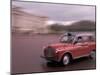 Cab racing past Buckingham Palace, London, England-Alan Klehr-Mounted Photographic Print