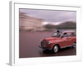 Cab racing past Buckingham Palace, London, England-Alan Klehr-Framed Photographic Print