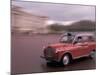 Cab racing past Buckingham Palace, London, England-Alan Klehr-Mounted Photographic Print