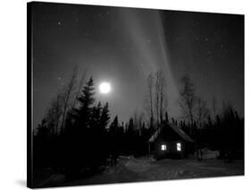 Cabin under Northern Lights and Full Moon, Northwest Territories, Canada March 2007-Eric Baccega-Stretched Canvas