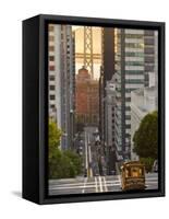 Cable Car Crossing California Street With Bay Bridge Backdrop in San Francisco, California, USA-Chuck Haney-Framed Stretched Canvas