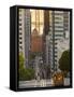 Cable Car Crossing California Street With Bay Bridge Backdrop in San Francisco, California, USA-Chuck Haney-Framed Stretched Canvas