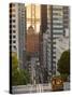 Cable Car Crossing California Street With Bay Bridge Backdrop in San Francisco, California, USA-Chuck Haney-Stretched Canvas