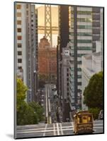 Cable Car Crossing California Street With Bay Bridge Backdrop in San Francisco, California, USA-Chuck Haney-Mounted Photographic Print