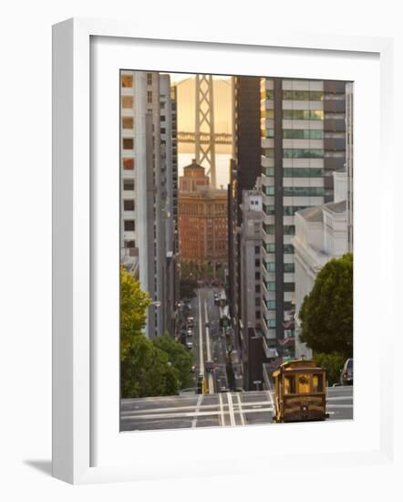 Cable Car Crossing California Street With Bay Bridge Backdrop in San Francisco, California, USA-Chuck Haney-Framed Photographic Print