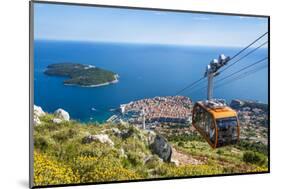 Cable car, Lokrum Island and Dubrovnik Old Town view, Dubrovnik, Dalmatian Coast, Croatia, Europe-Neale Clark-Mounted Photographic Print