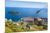 Cable car, Lokrum Island and Dubrovnik Old Town view, Dubrovnik, Dalmatian Coast, Croatia, Europe-Neale Clark-Mounted Photographic Print
