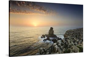 Cabo Carvoeiro and Nau dos Corvos at sunset, in front of the Atlantic Ocean. Peniche, Portugal-Mauricio Abreu-Stretched Canvas