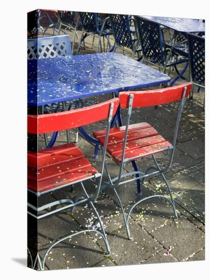 Cafe Table and Chairs on Oberer Rhineweg, Basel, Switzerland-Walter Bibikow-Stretched Canvas