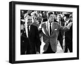 Calif Gov Ronald Reagan Escorts Pres-Elect Richard Nixon across Field at Halftime of Rose Bowl Game-null-Framed Photo