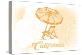 California - Beach Chair and Umbrella - Yellow - Coastal Icon-Lantern Press-Stretched Canvas