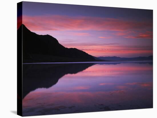 California, Death Valley National Park, Sunrise Reflects in Badwater-Christopher Talbot Frank-Stretched Canvas