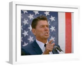 California Gubernatorial Candidate Ronald Reagan Speaking in Front of American Flag Backdrop-Bill Ray-Framed Photographic Print