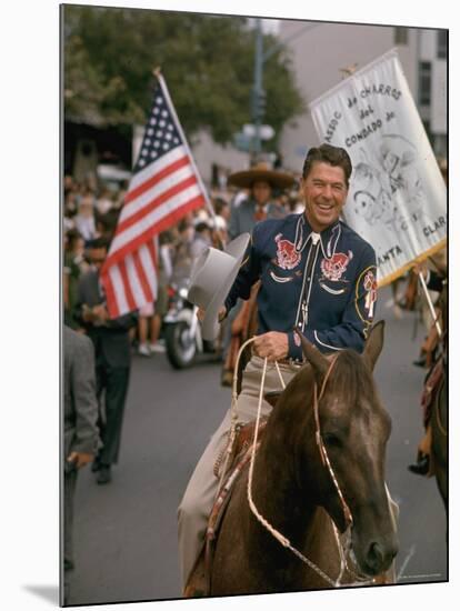 California Republican Gubernatorial Candidate Ronald Reagan, in Cowboy Attire, Riding Horse Outside-Bill Ray-Mounted Photographic Print