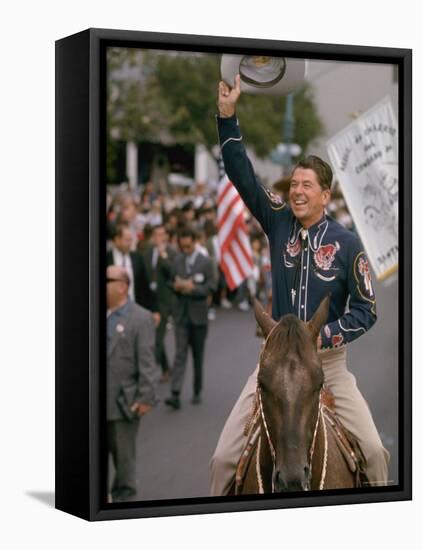 California Republican Gubernatorial Candidate Ronald Reagan in Cowboy Attire, Riding Horse Outside-Bill Ray-Framed Stretched Canvas