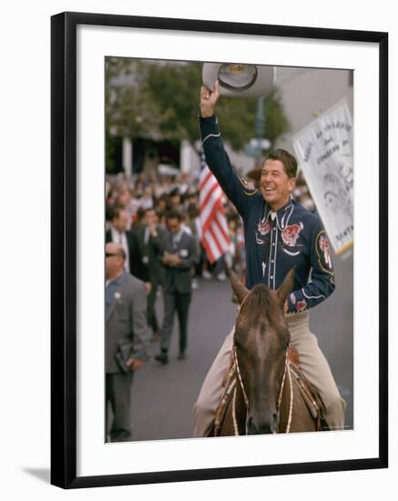 California Republican Gubernatorial Candidate Ronald Reagan in Cowboy Attire, Riding Horse Outside-Bill Ray-Framed Photographic Print