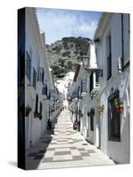 Calle San Sebastian, a Narrow Street in Mountain Village, Mijas, Malaga, Andalucia, Spain-Pearl Bucknall-Stretched Canvas