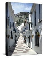 Calle San Sebastian, a Narrow Street in Mountain Village, Mijas, Malaga, Andalucia, Spain-Pearl Bucknall-Stretched Canvas