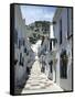 Calle San Sebastian, a Narrow Street in Mountain Village, Mijas, Malaga, Andalucia, Spain-Pearl Bucknall-Framed Stretched Canvas