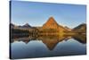 Calm Reflection in Two Medicine Lake in Glacier National Park, Montana, Usa-Chuck Haney-Stretched Canvas