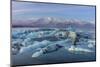 Calving icebergs in Jokulsarlon Glacier Lagoon in south Iceland-Chuck Haney-Mounted Photographic Print
