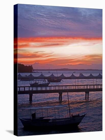 Camamu Bay, Island of Tinhare, Sunset over Jetty and Boats, Village of Morro De Sao Paulo, Brazil-Mark Hannaford-Stretched Canvas