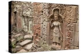 Cambodia, Angkor Wat, Carvings of Aspara dancers at 12th century Khmer temple complex-Merrill Images-Stretched Canvas