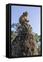 Cambodia, Angkor Wat. Long Tailed Macaque on Statue-Matt Freedman-Framed Stretched Canvas