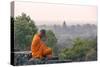 Cambodia, Siem Reap, Angkor Wat Complex. Monk Meditating with Angor Wat Temple in the Background-Matteo Colombo-Stretched Canvas