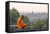 Cambodia, Siem Reap, Angkor Wat Complex. Monk Meditating with Angor Wat Temple in the Background-Matteo Colombo-Framed Stretched Canvas