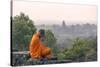 Cambodia, Siem Reap, Angkor Wat Complex. Monk Meditating with Angor Wat Temple in the Background-Matteo Colombo-Stretched Canvas