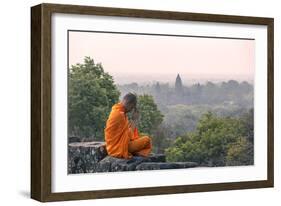 Cambodia, Siem Reap, Angkor Wat Complex. Monk Meditating with Angor Wat Temple in the Background-Matteo Colombo-Framed Photographic Print