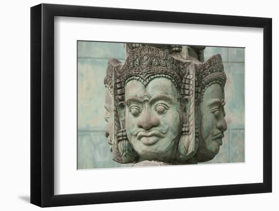 Cambodia, Siem Reap, carved statues at Buddhist temple.-Merrill Images-Framed Photographic Print