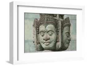 Cambodia, Siem Reap, carved statues at Buddhist temple.-Merrill Images-Framed Photographic Print