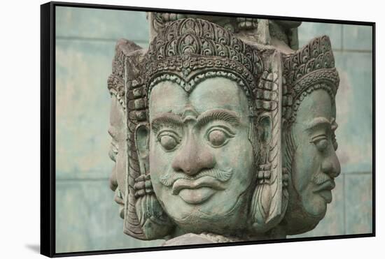 Cambodia, Siem Reap, carved statues at Buddhist temple.-Merrill Images-Framed Stretched Canvas