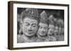 Cambodia, Siem Reap, carved statues at Buddhist temple.-Merrill Images-Framed Photographic Print