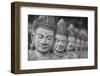 Cambodia, Siem Reap, carved statues at Buddhist temple.-Merrill Images-Framed Photographic Print