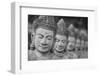 Cambodia, Siem Reap, carved statues at Buddhist temple.-Merrill Images-Framed Photographic Print