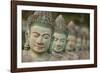 Cambodia, Siem Reap, carved statues at Buddhist temple.-Merrill Images-Framed Photographic Print