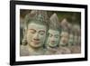 Cambodia, Siem Reap, carved statues at Buddhist temple.-Merrill Images-Framed Photographic Print