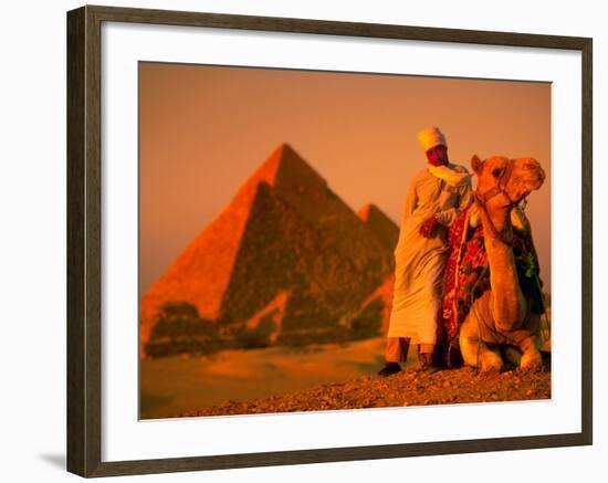 Camel and Driver Resting near the Great Pyramids, Egypt-Alexander Nesbitt-Framed Photographic Print